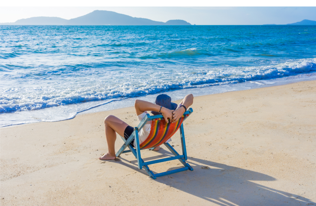 Importance of sun exposure for Vitamin D, man in a beach