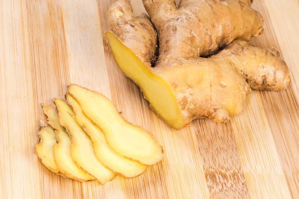 Partly sliced fresh ginger root for reducing gut inflammation